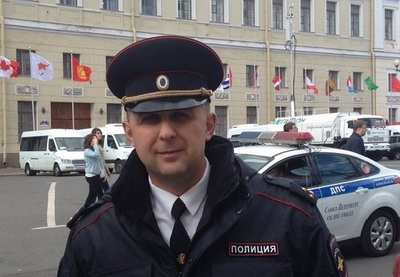 В России полицейский-неонацист избил предпринимательницу из Азербайджана - ФОТО