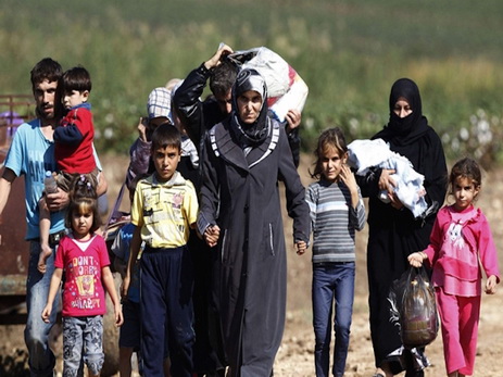Турция намерена продолжить принимать беженцев из Сирии