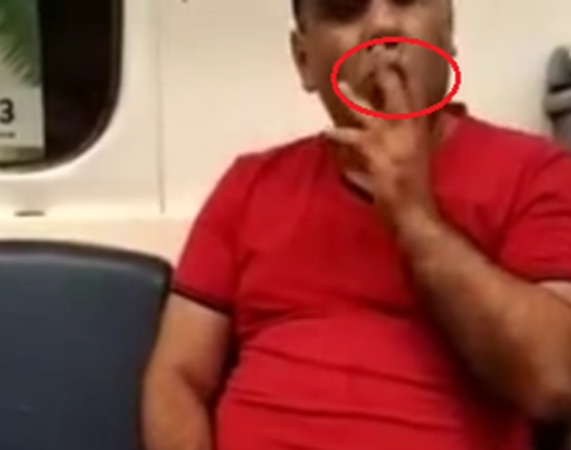 Bakı metrosunda biabırçılıq - qatarda siqaret çəkdi - VİDEO