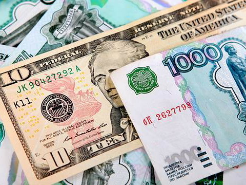 Курс доллара приближается к 70 рублям