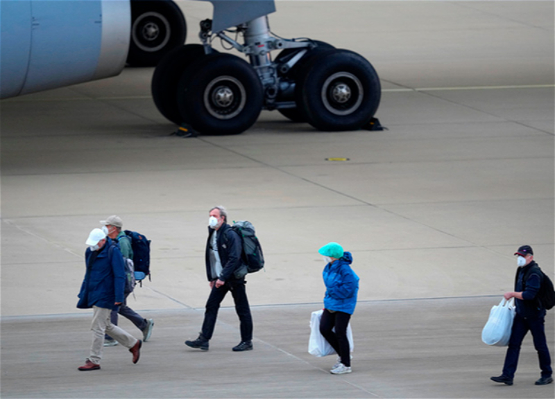 Planes with passengers from liner with hantavirus outbreak land in the Netherlands