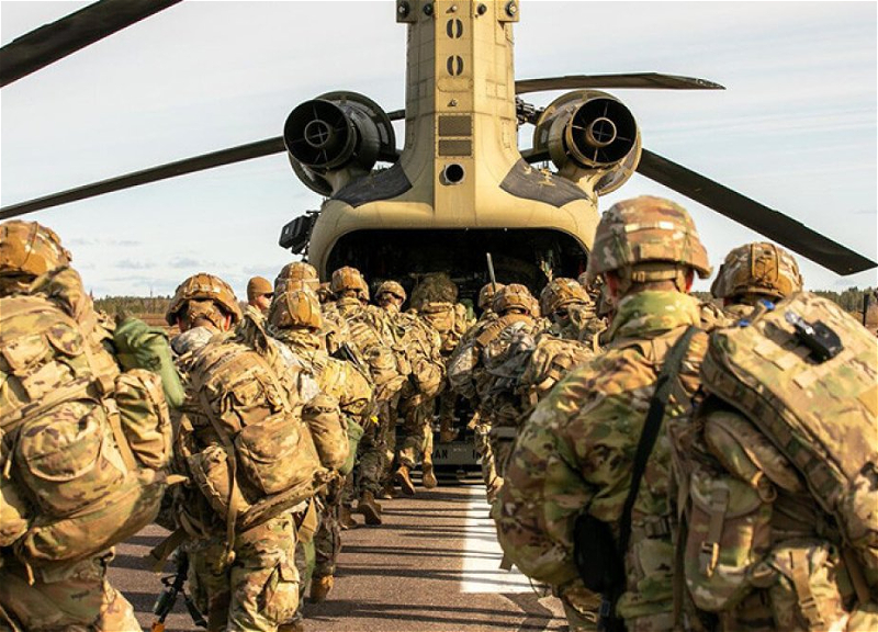 Trump reports decision to send additional 5,000 troops to Poland