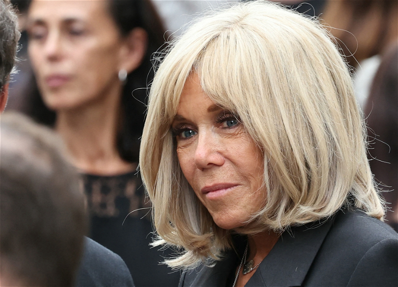 Paris court sides with journalist who called Macron's wife a man