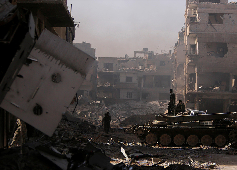 Syria's Defense Ministry reports 11 soldiers killed in explosion at military depot in Deir ez-Zor