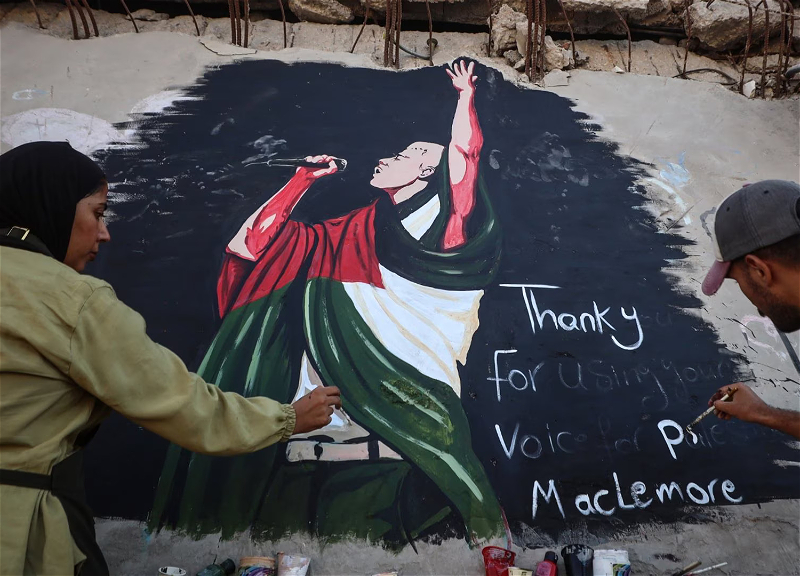 A mural honoring Macklemore created in Gaza after his removal from Ed Sheeran's tour – PHOTO