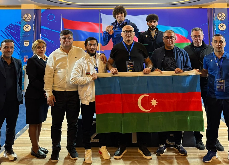 Azerbaijani weightlifter Gasym Ismayilov wins three medals at the European Championship in Albania