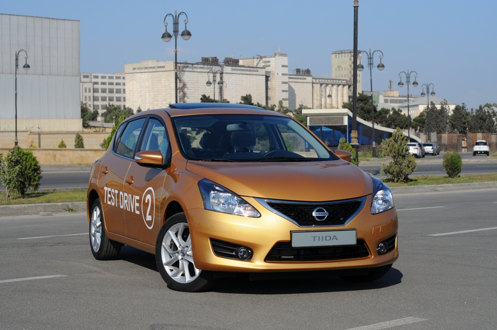 Новинка сезона - обновленный Nissan Tiida-2013 - ФОТО - ВИДЕО
